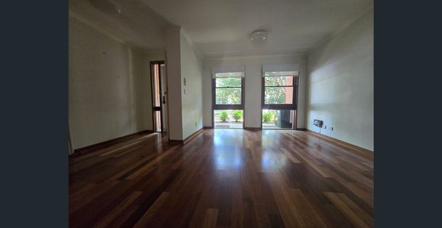 Beautifully Renovated 4-Bedroom Townhouse in the Heart of Parkville - Photo 1