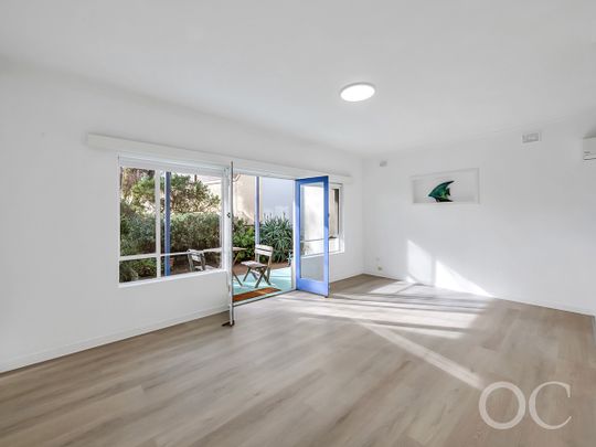 Where Beachside Bliss Meets Modern Convenience - Photo 1