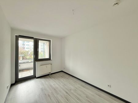 Schöne 3-Zimmer-Erdgeschosswohnung mit Balkon in zentrumsnaher Lage - Photo 2