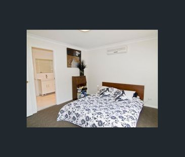 Lowset brick home with large pergola - Photo 4