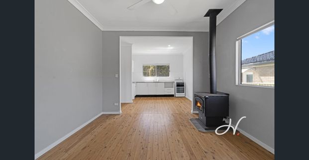 CHARACTER COTTAGE WITH LAKESIDE CONVENIENCE - Photo 1