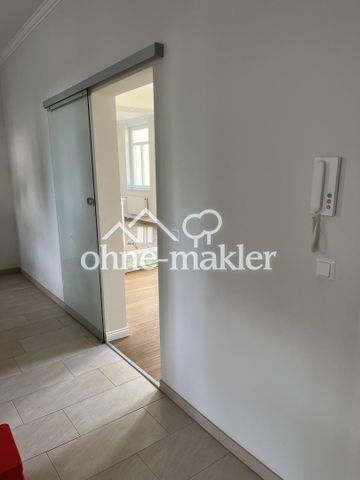 Hauscharakter Charmante 5,5-Zimmer-Altbauwohnung mit Einbauküche und großem Garten - Photo 2