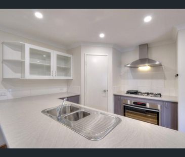 Lovely Inside and Ready to Move In – Bright & Modern 3x2 - Photo 1