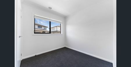 **RECEIVE ONE MONTH FREE RENT, ASK US HOW! Modern 4-Bedroom Home for Lease in Fraser Rise - Photo 4