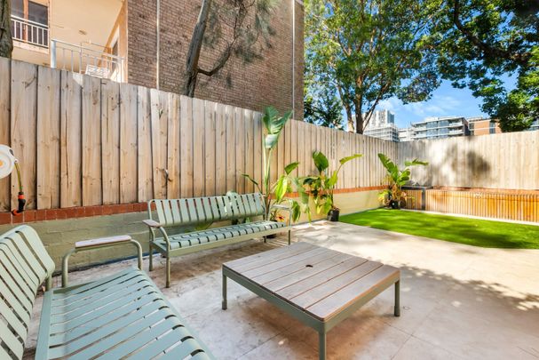 Spacious Apartment with Large Courtyard in the Heart of Kensington! - Photo 1