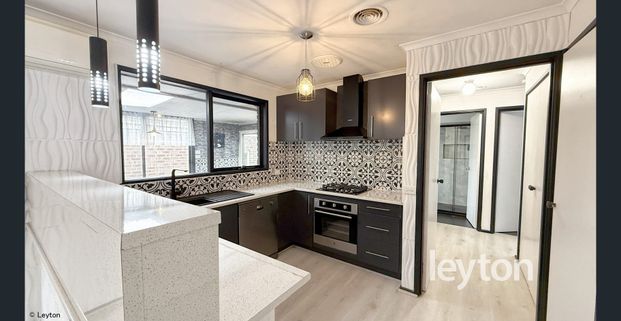 Modern Comfort in a Family-Friendly Location - Photo 1