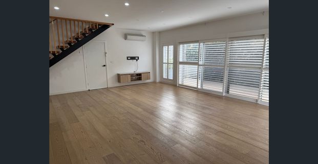 Modern living with four generous bedrooms - Photo 1