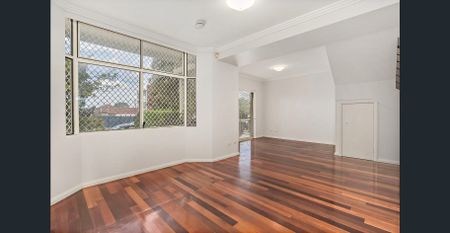 Tastefully updated with an ultra-convenient location! - Photo 2