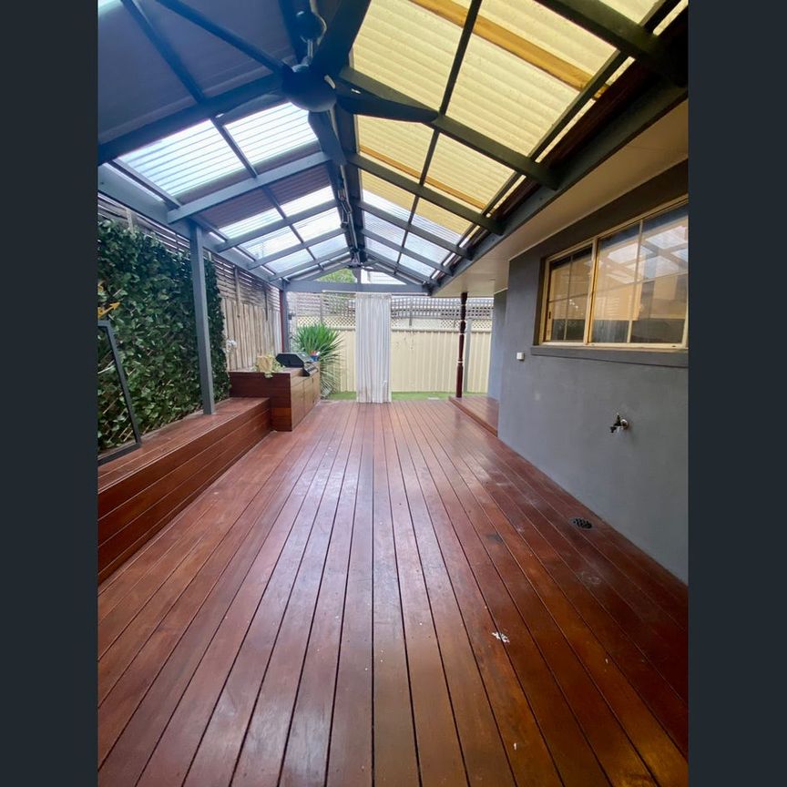 Stunning Two-Level Family Home in Prime Airport West Location - Photo 1