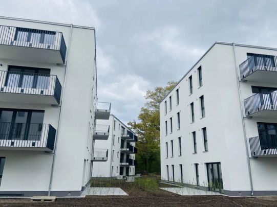 Erstbezug! 3 Zimmer mit Terrasse, Einbauküche und Stellplatz mit E-Ladefunktion - Foto 1