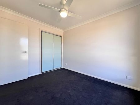 NEAR NEW 4 BEDROOM HOME - Photo 4