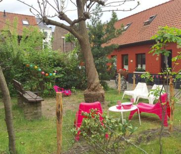 Woonerfwoning met schitterende gemeenschappelijke tuin! - Photo 6