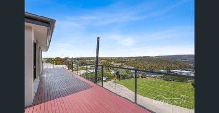 Spacious Family Haven with Breathtaking Views and Multiple Living Areas - Photo 2