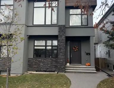 Cozy 4 bedroom place in a great location! | 2828 40 Street Southwest, Calgary - Photo 1