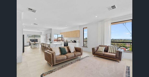 Elevated Coastal Living with Estuary & Ocean Glimpses - Photo 1