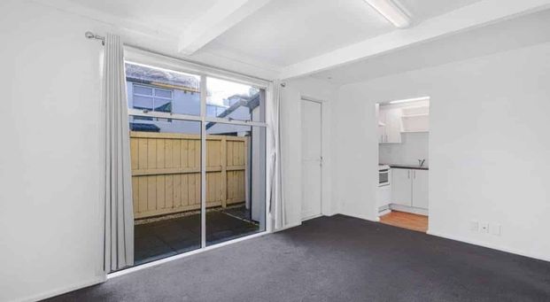 Charming 2BR Townhouse with Single garage - Photo 1