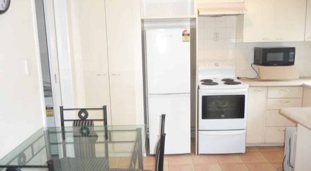 Fully Furnitured one bedroom unit with a carport - Photo 3