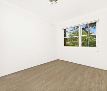 Conveniently Located with a Lock-Up Garage - Photo 6