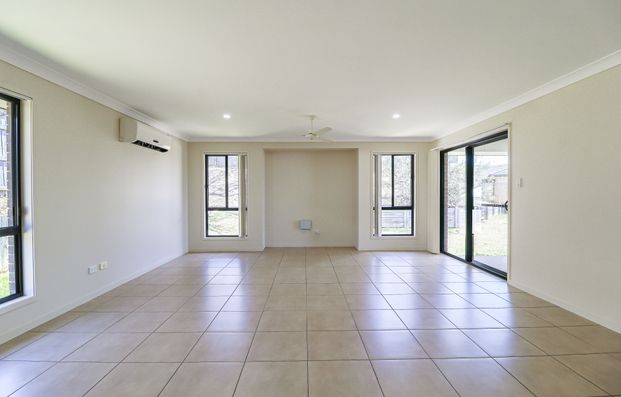 Stylish, Spacious, and Set to Impress - Welcome to 28 Liriope Drive! - Photo 1