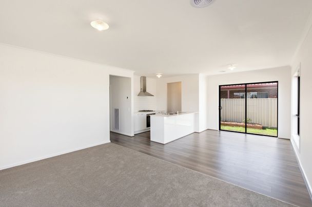 NEAR NEW THREE BEDROOM HOME IN GREAT LOCATION - Photo 1