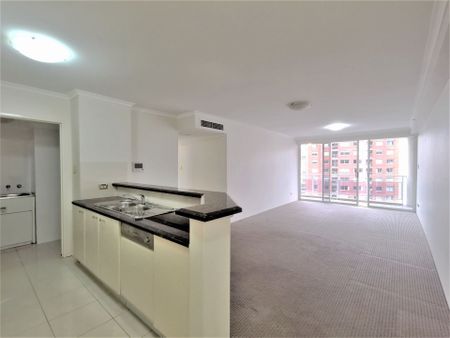 Unfurnished 2 bedroom plus car space for rent in the heart of CBD! - Photo 4