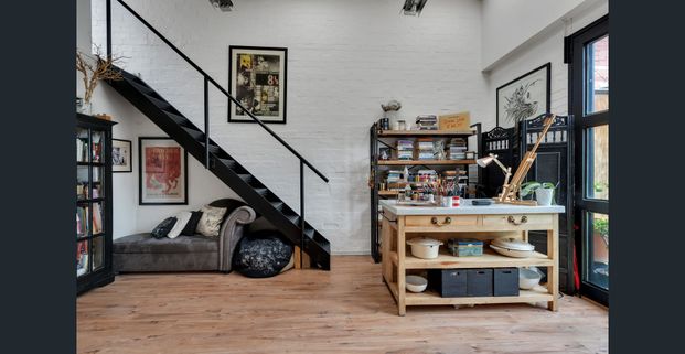 Versatile One Bedroom with Loft Studio and Courtyard - Photo 1