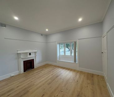 Updated Five Bedroom Home in an Ultra Convenient Location - Photo 1