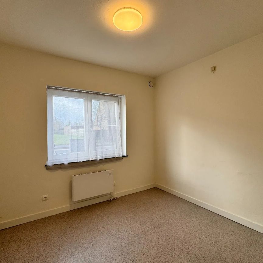 Verzorgd gelijkvloers appartement met 2 slaapkamers en garage. - Photo 1