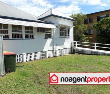 Spacious Four-Bedroom Queenslander with Timeless Charm in Clayfield - Photo 5