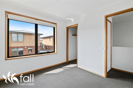 Comfortable, Modern, Two-Levels & Great Location - Photo 2
