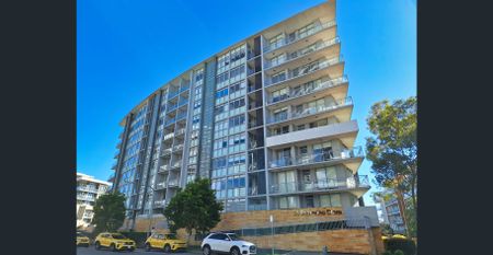 Modern and Spacious 2-Bedroom Apartment with Water View - Photo 2