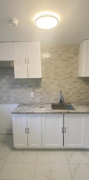 Luxueux 3 ½ Neuf à Louer – Anjou – Avec Stationnement Privé - Photo 1