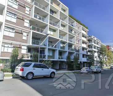 Modern 2 bedroom apartment close to amenities for lease - Photo 1