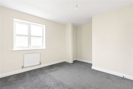 A four bedroom detached family home with a double garage and off-street parking in the village of Newton. - Photo 4