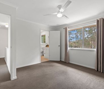 Updated Townhouse with Private Courtyard – Rent Includes Water Usage! - Photo 1