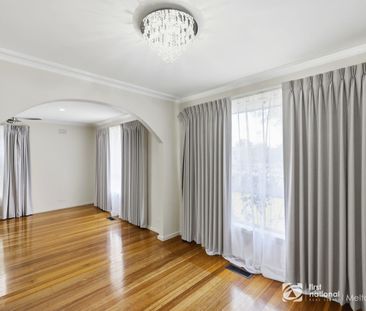 Stylish Renovated Home Offering Comfort and Space - Photo 2