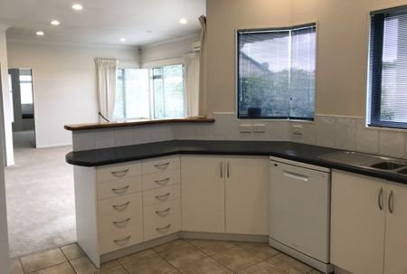 This is a stunning executive home, welcomed through the entrance way to the open dining or family, the large kitchen, with bifold doors that take you through to your own private patio with a stunning view. - Photo 2