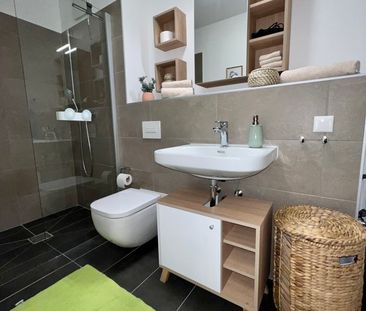 Exklusives Apartment mit Terrasse in zental gelegenem Neubau - Photo 1