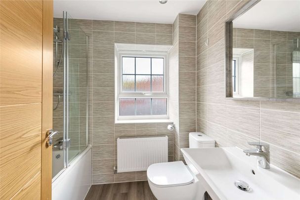 Stylish, modern family home in Wilmslow, with garage and enclosed garden - Photo 1