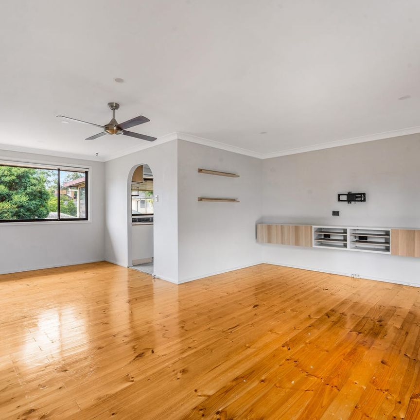 Spacious Family Home with Side Access & Entertainer’s Backyard! - Photo 1