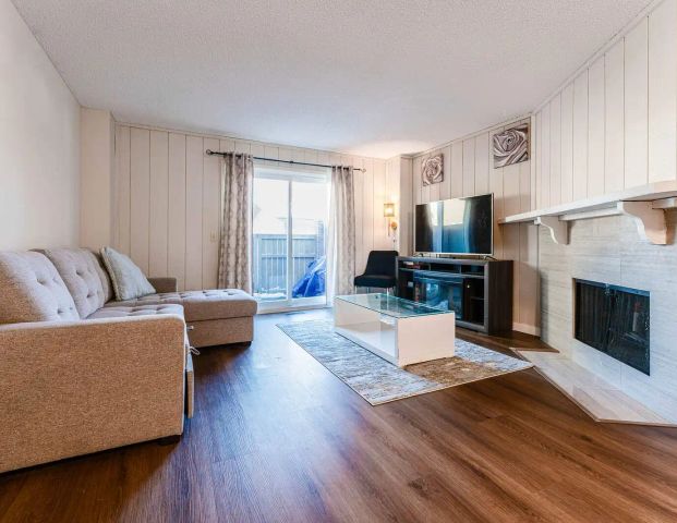 Refreshed & Renovated End Unit Townhouse — 3 Bedrooms Townhouse - Photo 1