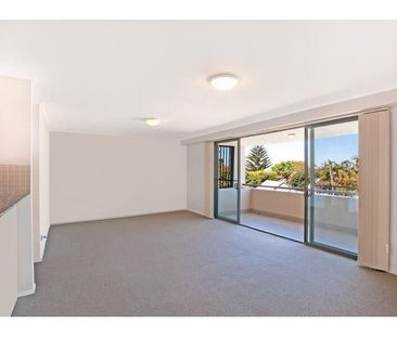 Refined Coastal Living in a Sun-Filled Two-Bedroom Apartment - Photo 1