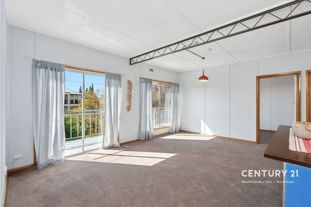 Coastal Living at Its Best – 3-Bedroom Unit Just Minutes from the Beach! - Photo 1