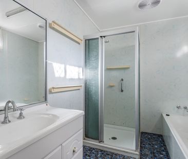 HUGE HOME! 3-BEDROOMS + 2 SLEEPOUTS + STUDY - Photo 5