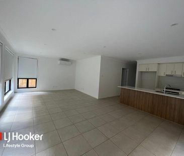 Tidy Four-Bedroom Home with Open-Plan Living & Outdoor Entertaining - Photo 1