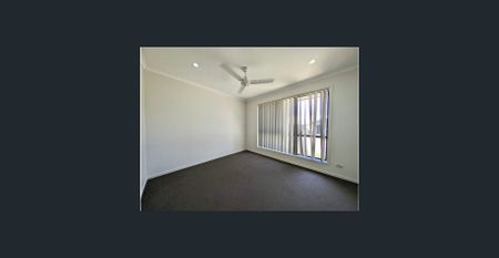 Low maintenance family home with covered outdoor entertaining | Located in prime location - Photo 5