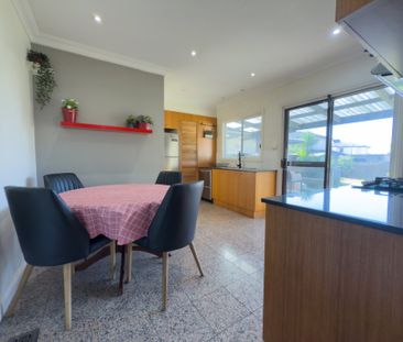 Comfortable Family Living in a Convenient Location - Photo 1