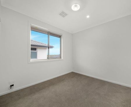 Modern Comforts Await in This 4-Bedroom, 2-Bathroom Home - Photo 5