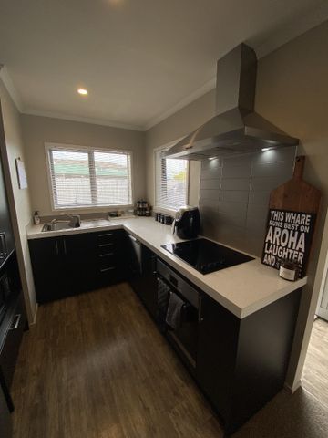 This tidy 2-bedroom, 1-bathroom brick home in Frankton offers comfortable, low-maintenance living in a quiet street. - Photo 5