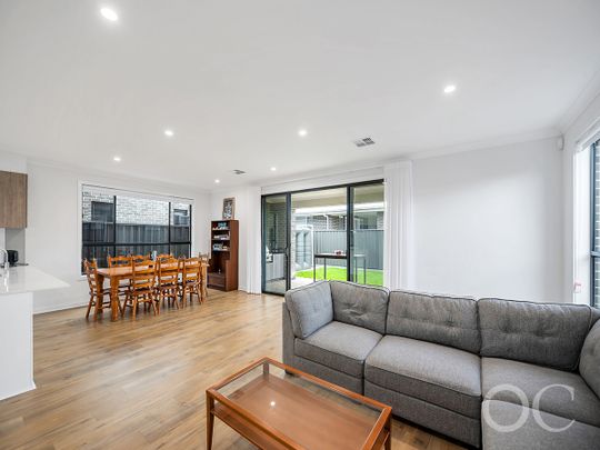 Open the Door to Sun-Soaked Living in a Premium Woodville West Pocket - Photo 1